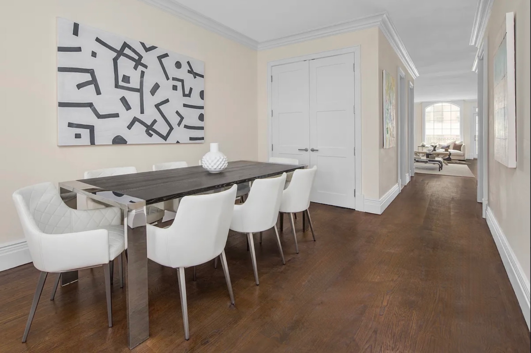 236 West 24th Street, Unit PH Manhattan, NY 10011 - Photo 7 of 14 a view of a dining room with furniture and wooden floor