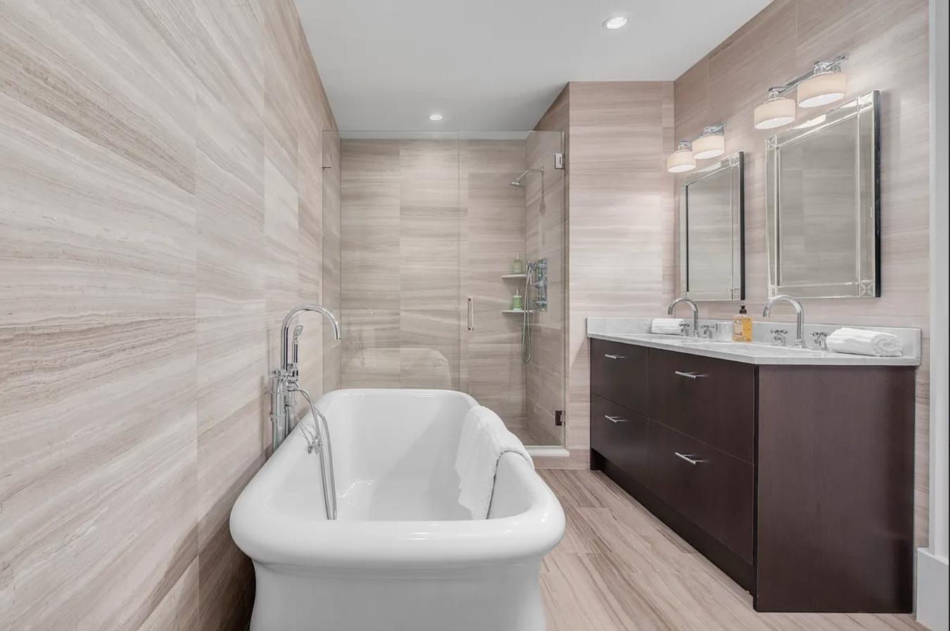 236 West 24th Street, Unit PH Manhattan, NY 10011 - Photo 9 of 14 a bathroom with a sink and a bathtub