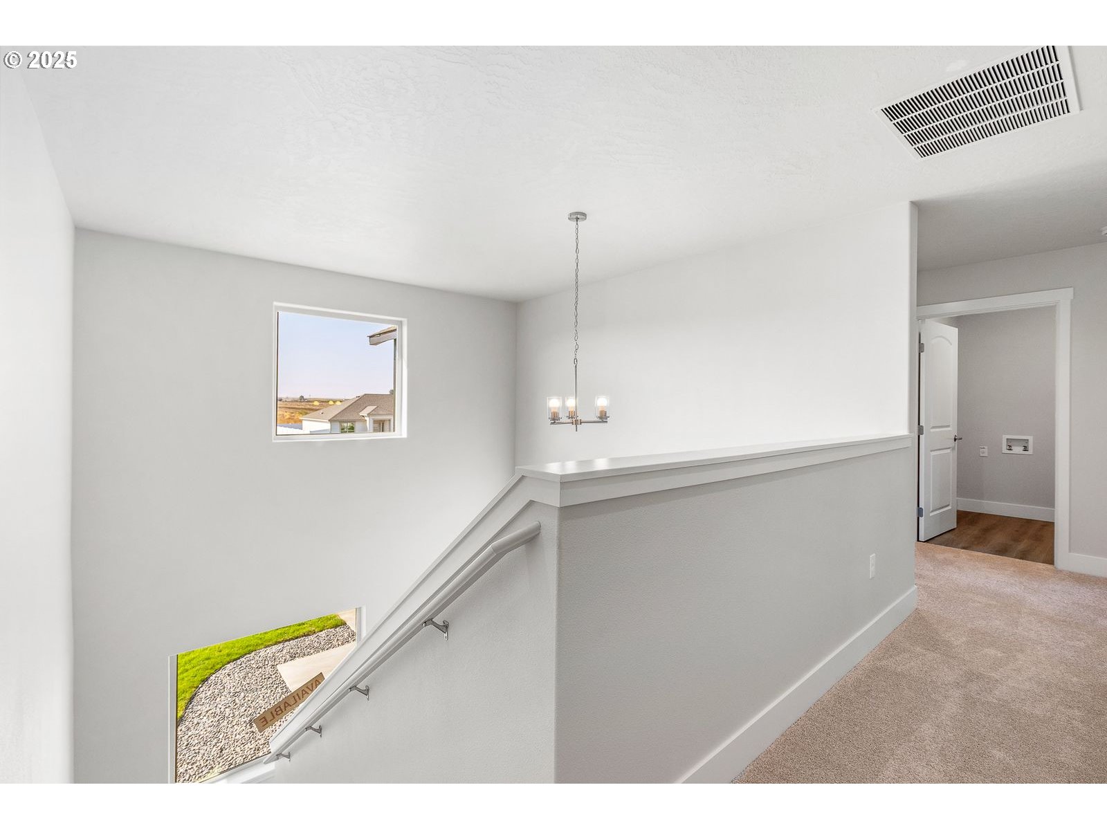 104 Tiber Court Boardman, OR 97818 - Photo 13 of 33 a view of hallway with stairs