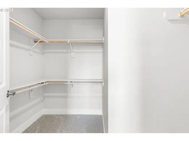 a view of an empty walk in closet