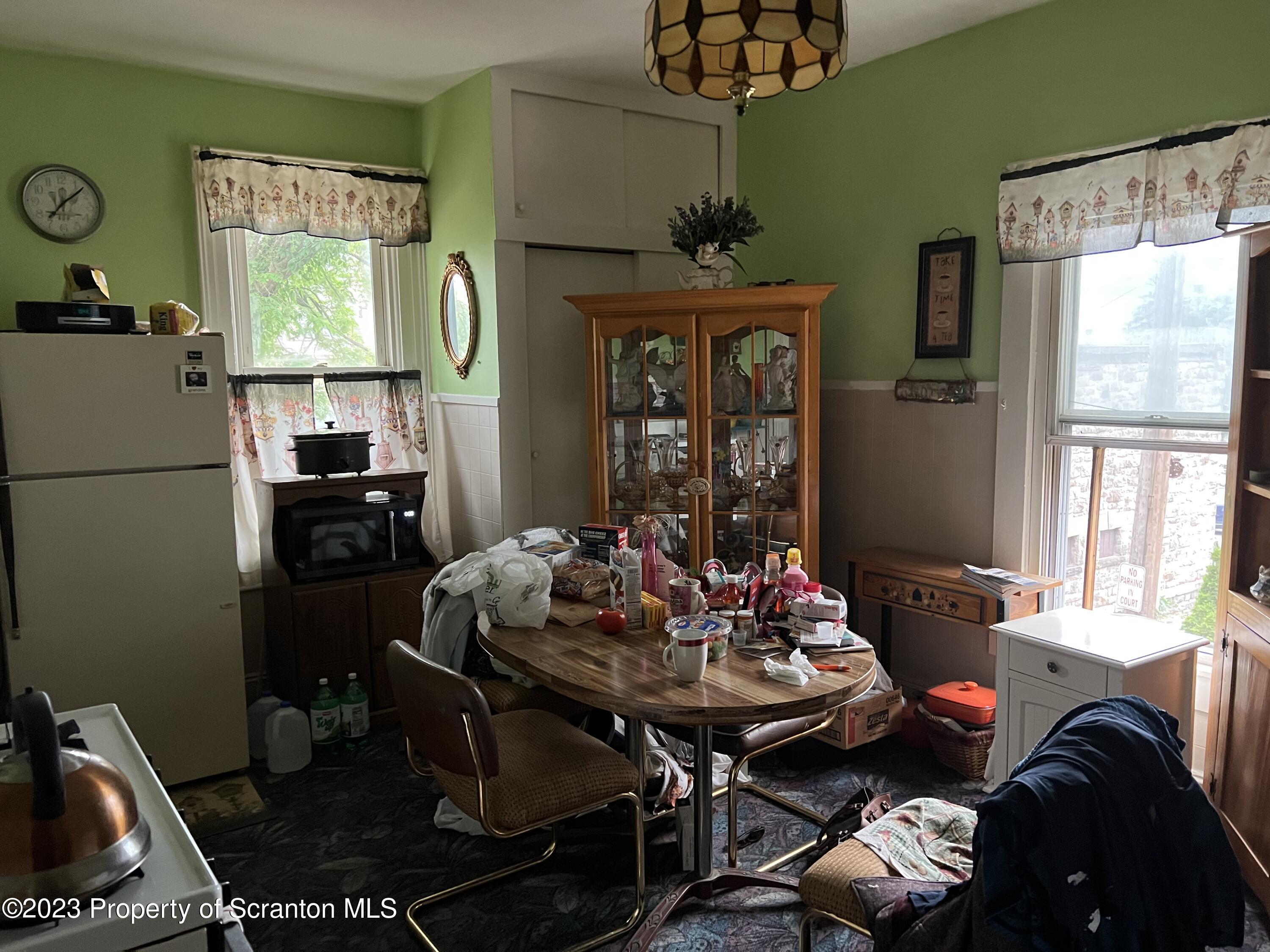 1613 Olive Street Scranton, PA 18510 - Photo 16 of 22 a living room with furniture and a window