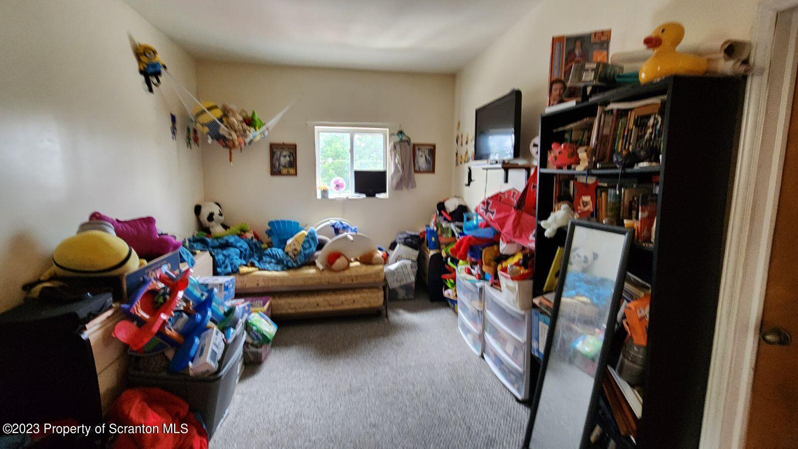1613 Olive Street Scranton, PA 18510 - Photo 19 of 22 a room with furniture and closet