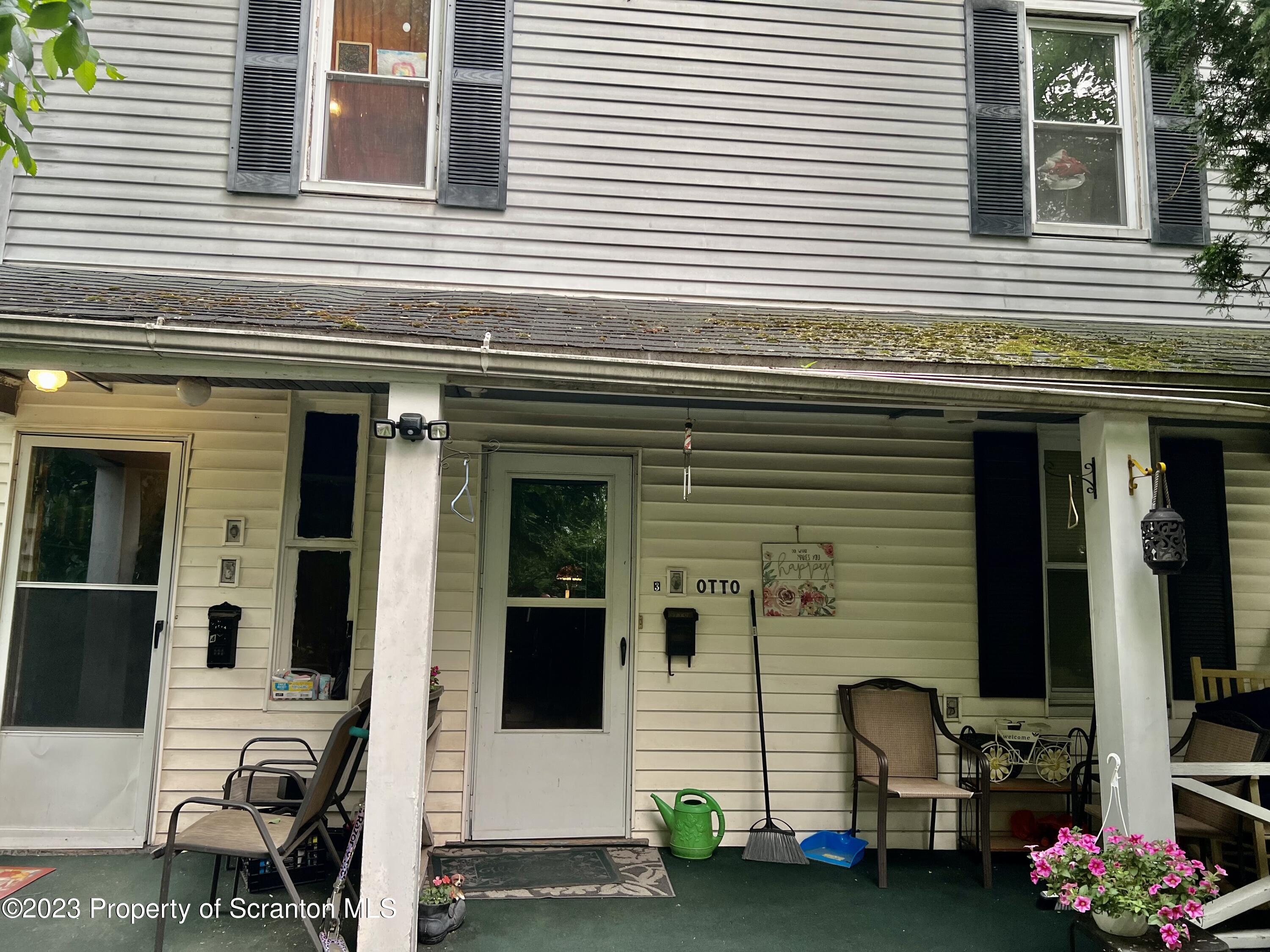 1613 Olive Street Scranton, PA 18510 - Photo 3 of 22 a view of a building with many windows