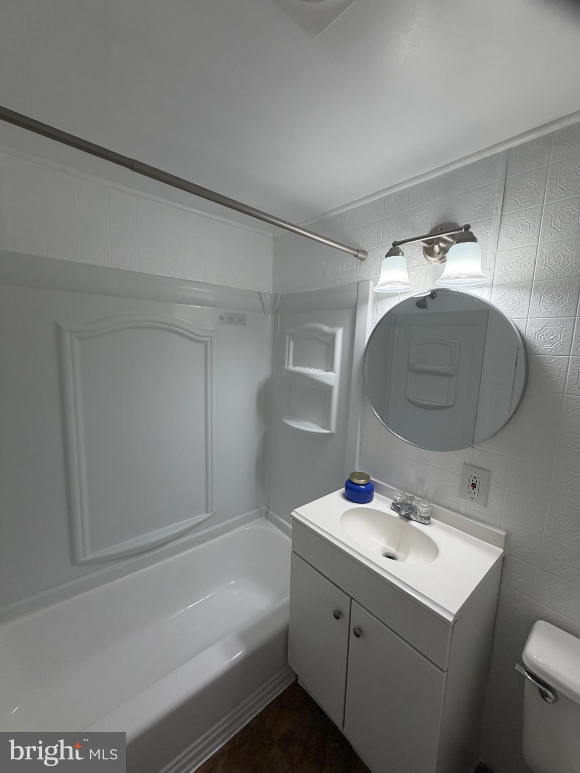 11514 Bucknell Drive, Unit 102 Silver Spring, MD 20902 - Photo 17 of 23 Bright and functional bathroom.