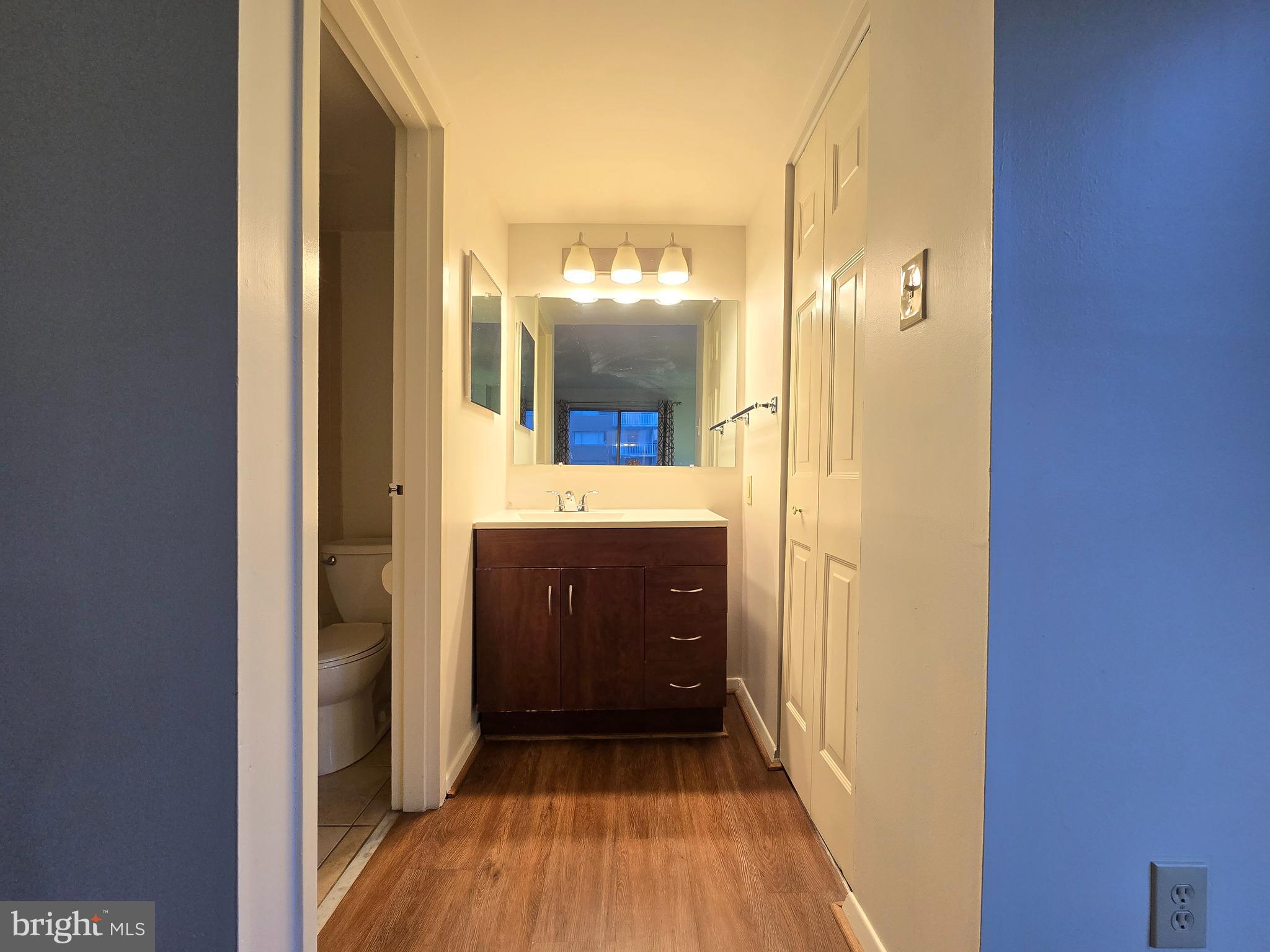 1836 Metzerott Road, Unit 1524 Hyattsville, MD 20783 - Photo 20 of 22 a view of a bathroom from a hallway