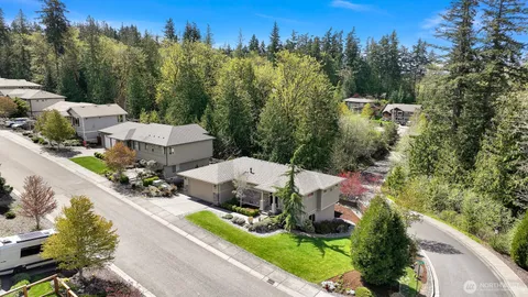 an aerial view of a house with outdoor space