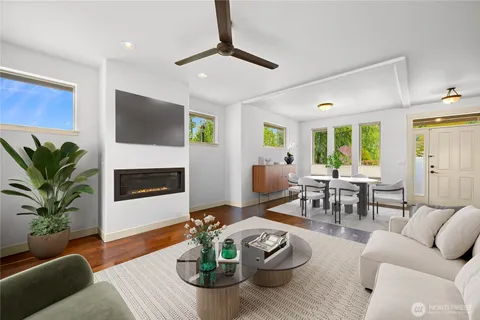 a living room with furniture fireplace and a flat screen tv