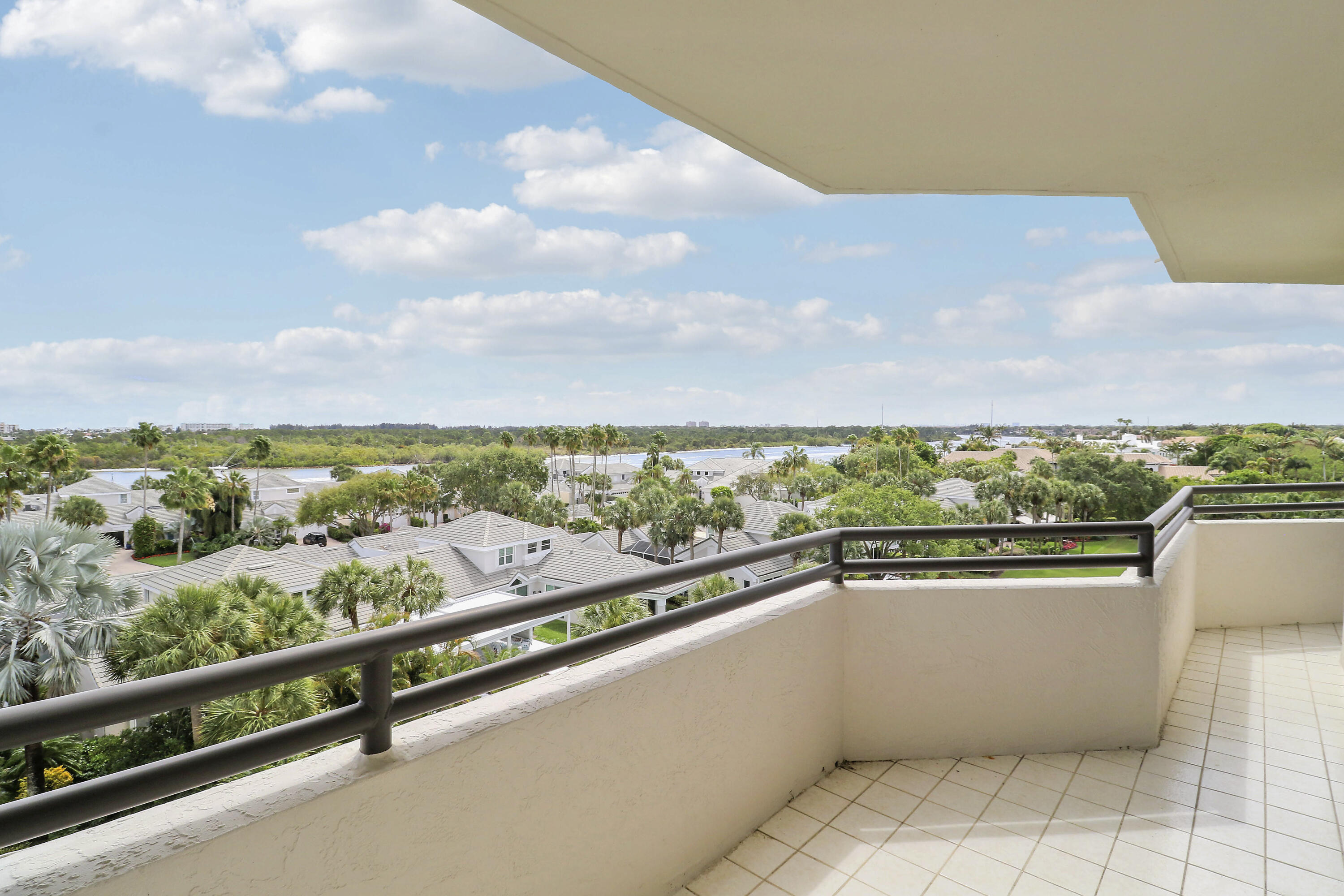 3322 Casseekey Island Road, Unit 604 Jupiter, FL 33477 - Photo 37 of 55 a view of city and mountain from a balcony