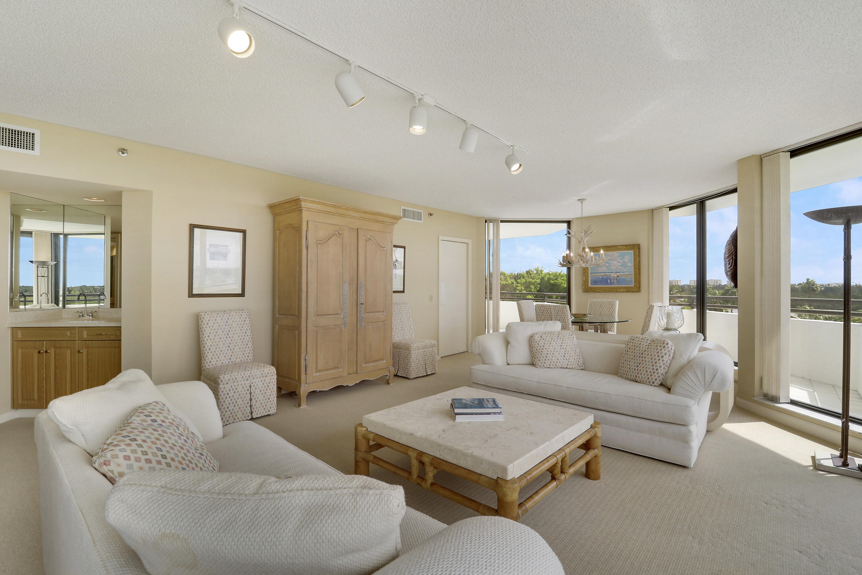 3322 Casseekey Island Road, Unit 604 Jupiter, FL 33477 - Photo 8 of 55 a living room with furniture and a large window