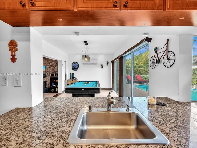 an aerial view of residential building and ocean