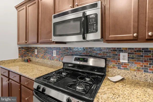 a balcony with furniture and wooden floor
