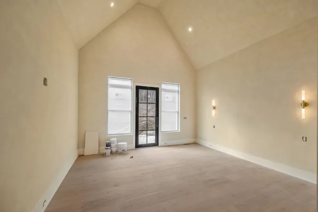 a view of an empty room and window