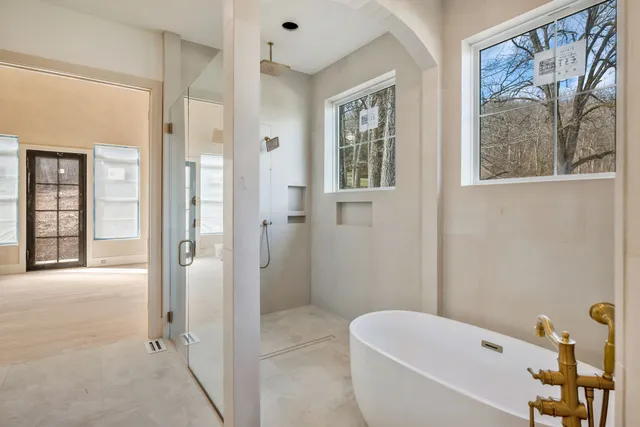 a kitchen with kitchen island a counter top space and refrigerator