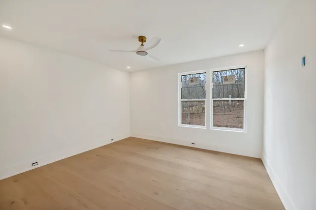 a view of an empty walk in closet