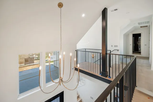a view of a living room and a large window