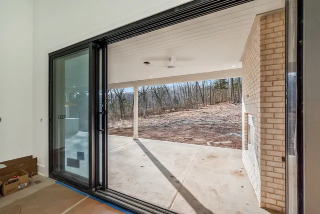 a view of a living room and window