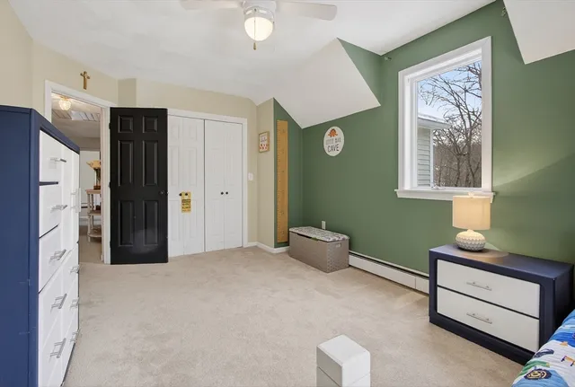 a view of a livingroom with furniture and a window