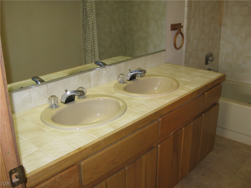 335 Ski Way, Unit 314 Incline Village, NV 89451 - Photo 3 of 15 a bathroom with a sink and a mirror
