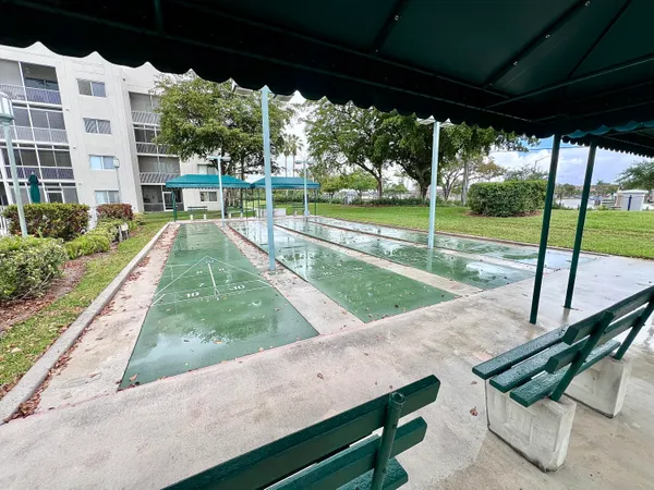 a view of swimming pool with a patio