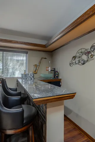 a view of a livingroom with furniture and window