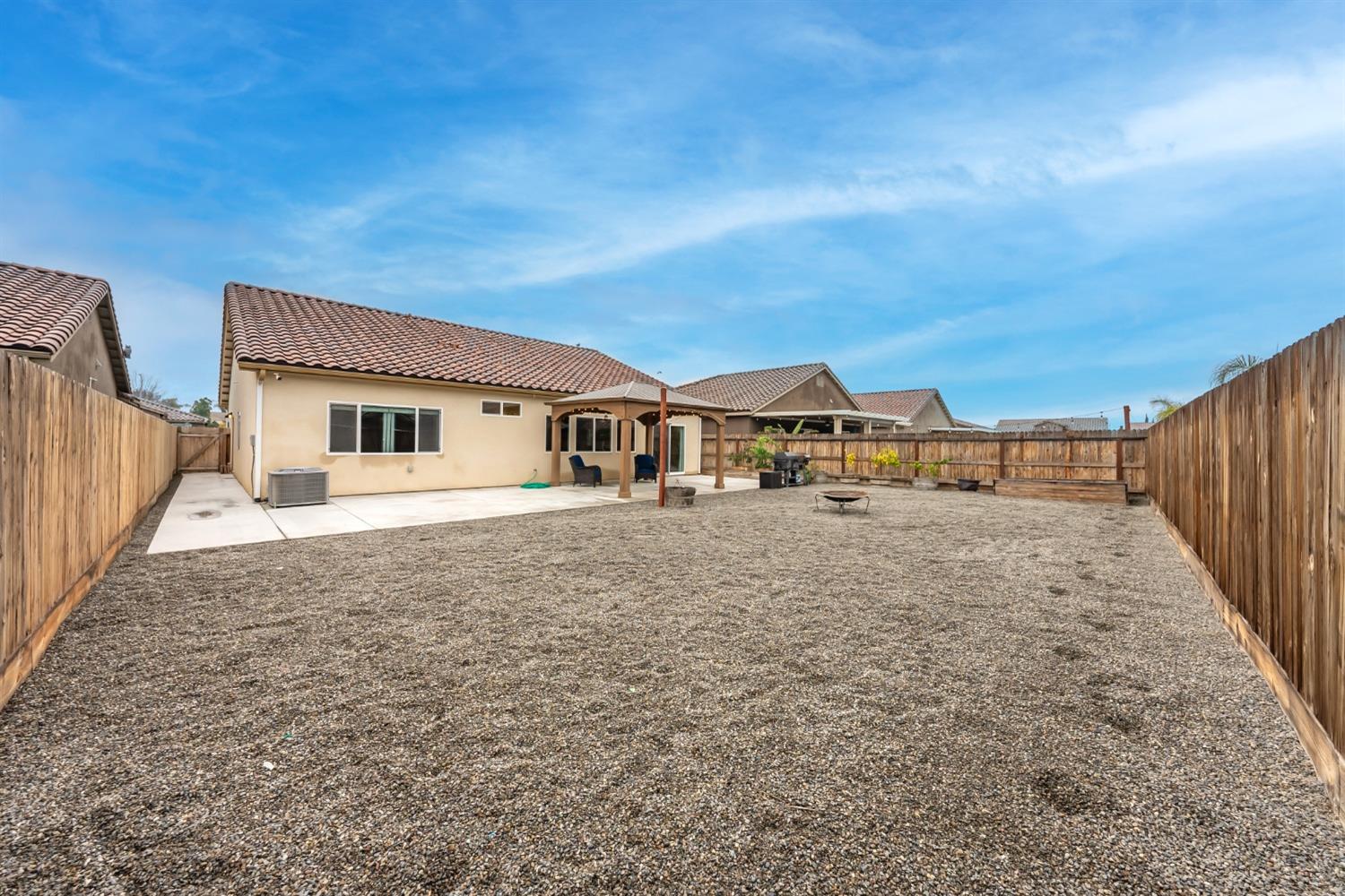 742 Strada Street Lemoore, CA 93245 - Photo 29 of 40 a view of house with outdoor space