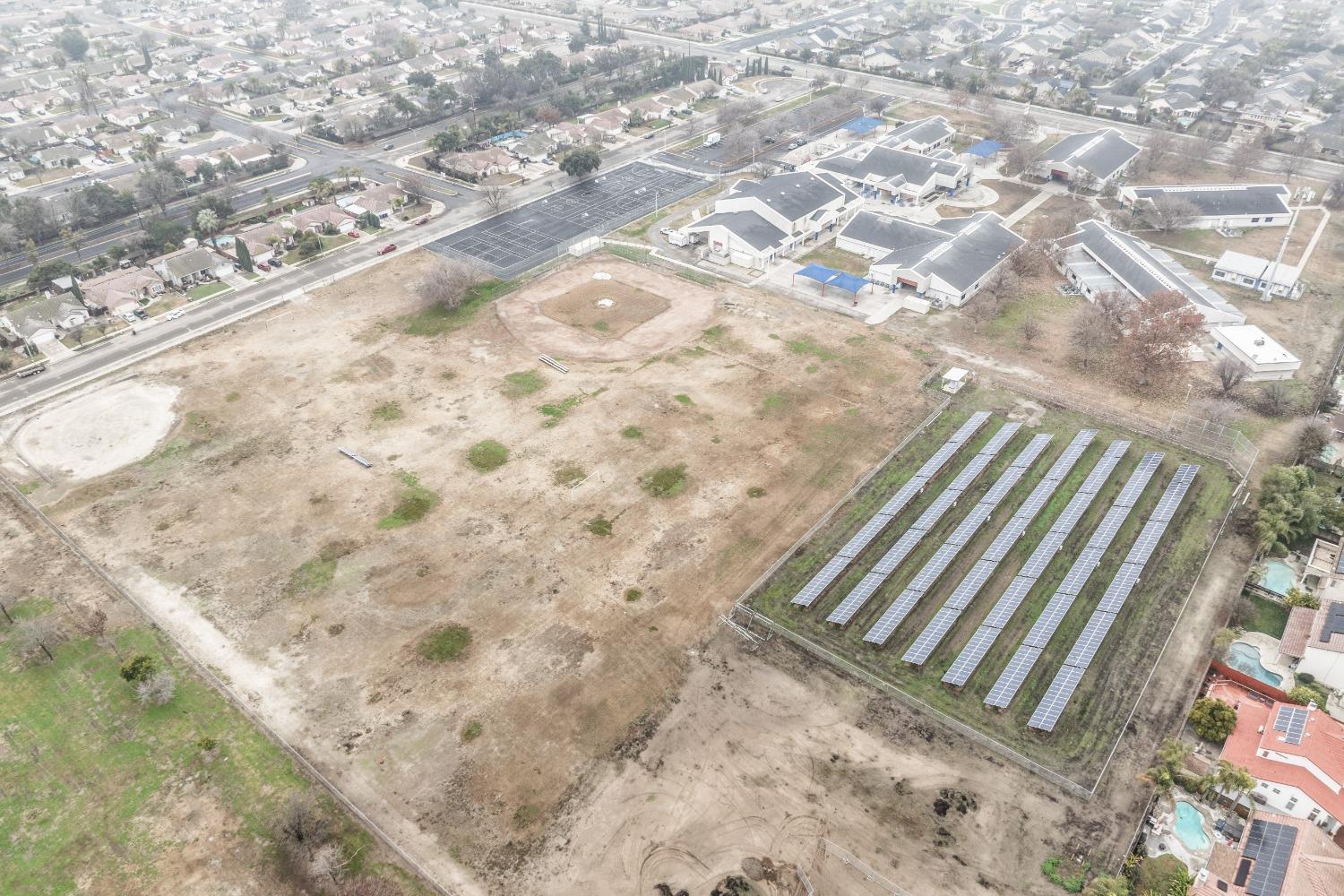 742 Strada Street Lemoore, CA 93245 - Photo 39 of 40 a view of a backyard
