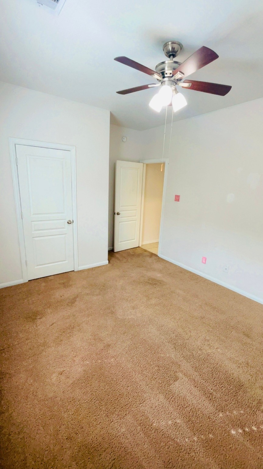 8626 Willet Street Baytown, TX 77521 - Photo 14 of 37 a view of an empty room