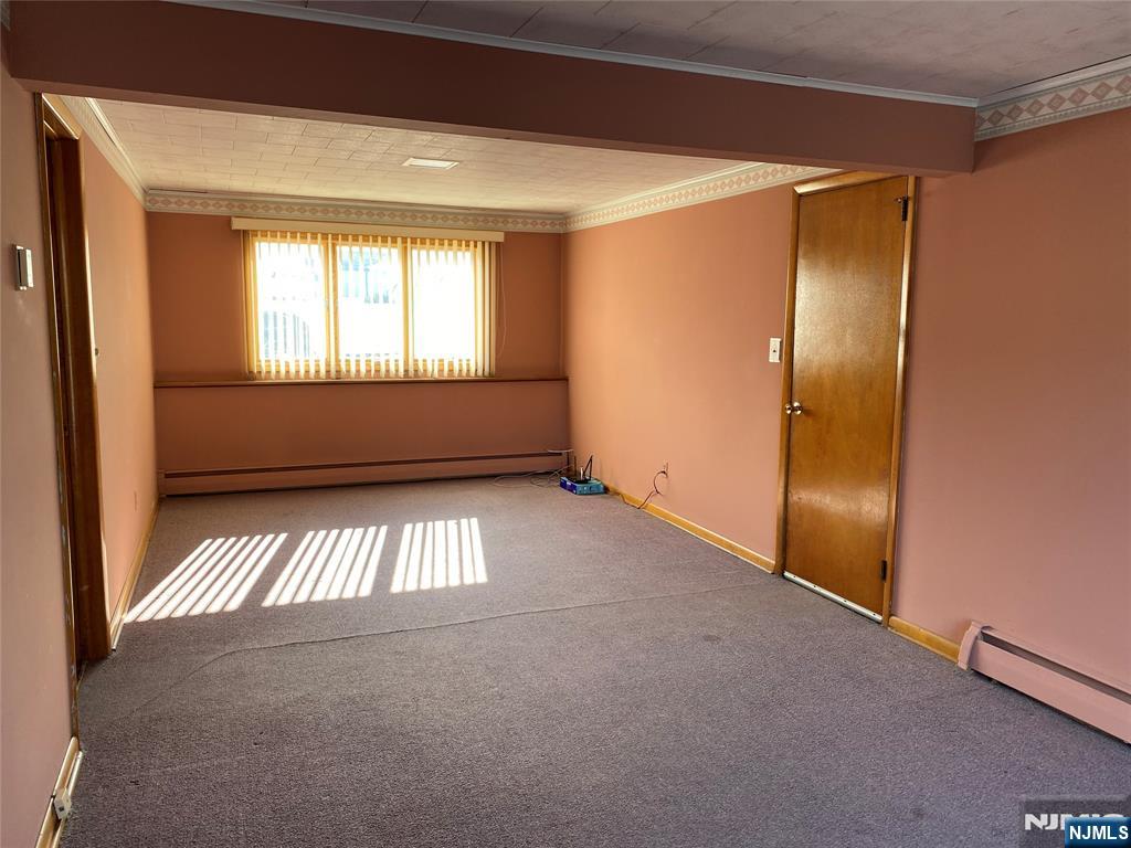 95 Atkins Terrace East Rutherford, NJ 07073 - Photo 21 of 31 an empty room with windows