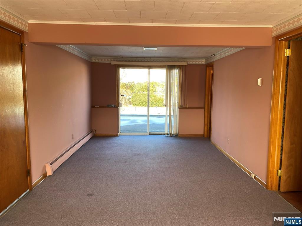 95 Atkins Terrace East Rutherford, NJ 07073 - Photo 22 of 31 a view of empty room with floor to ceiling window