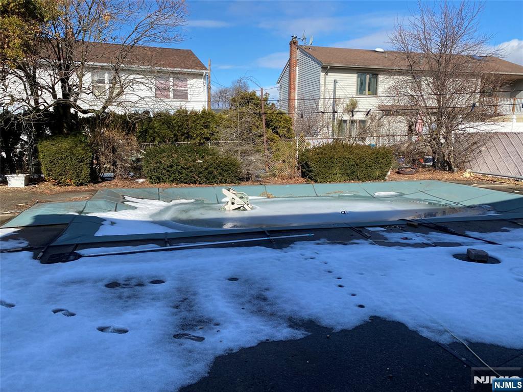 95 Atkins Terrace East Rutherford, NJ 07073 - Photo 29 of 31 a view of a house with a street
