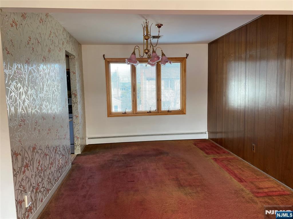 95 Atkins Terrace East Rutherford, NJ 07073 - Photo 6 of 31 a view of an empty room with a window