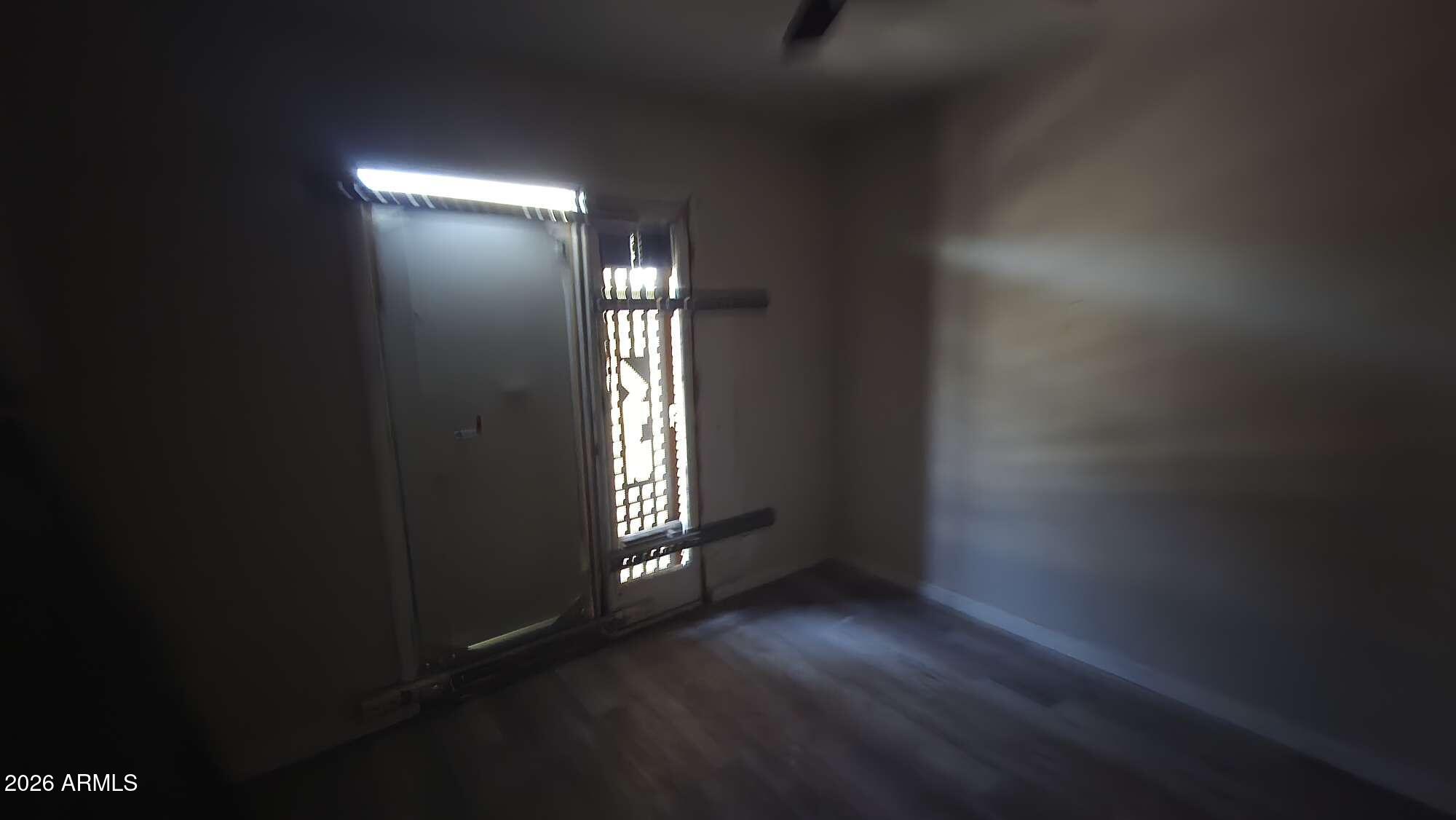 834 West Osborn Road Phoenix, AZ 85013 - Photo 43 of 45 a view of wooden floor and windows in an empty room