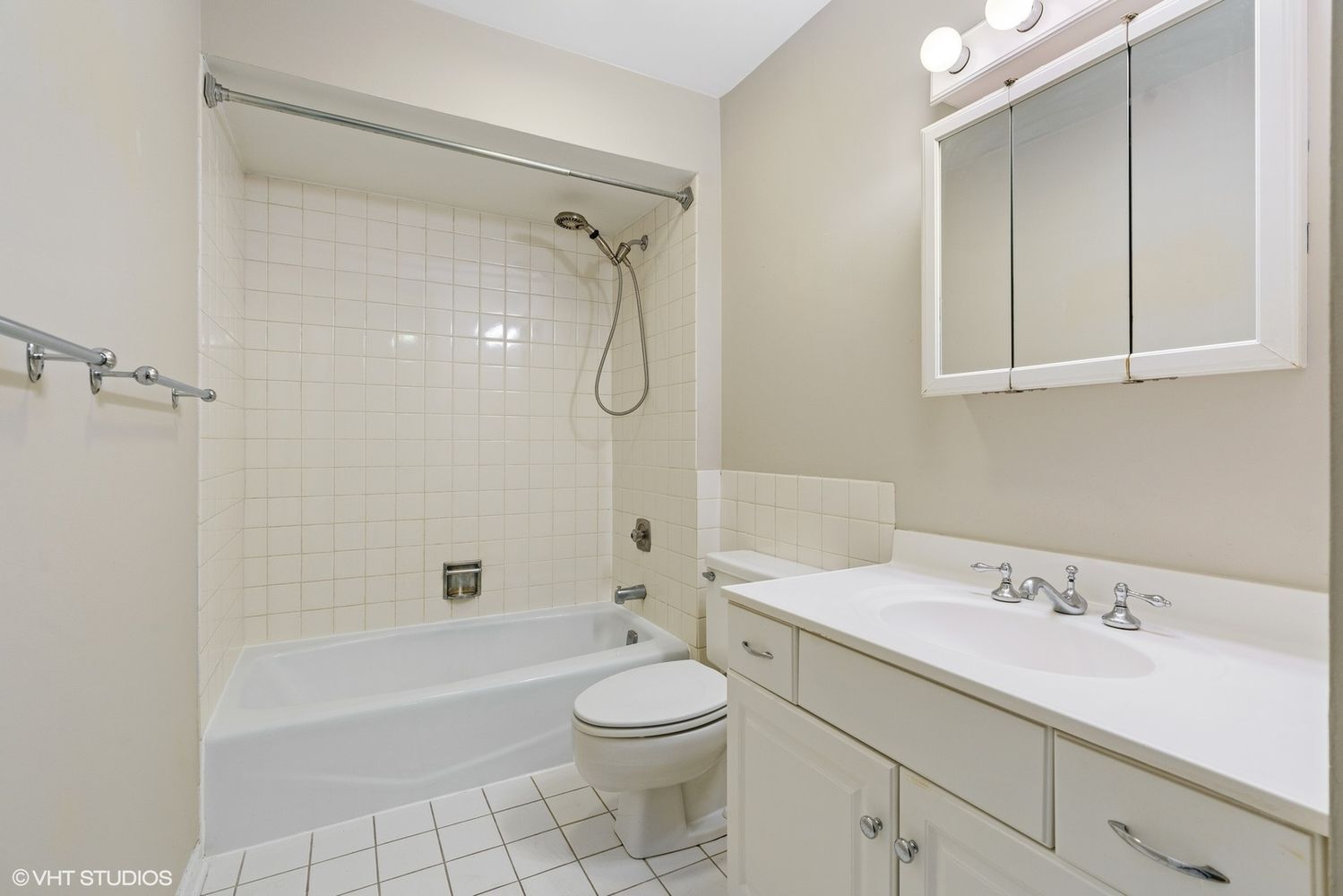 Undisclosed Address Chicago, IL 60610 - Photo 12 of 12 a bathroom with a sink a toilet and shower