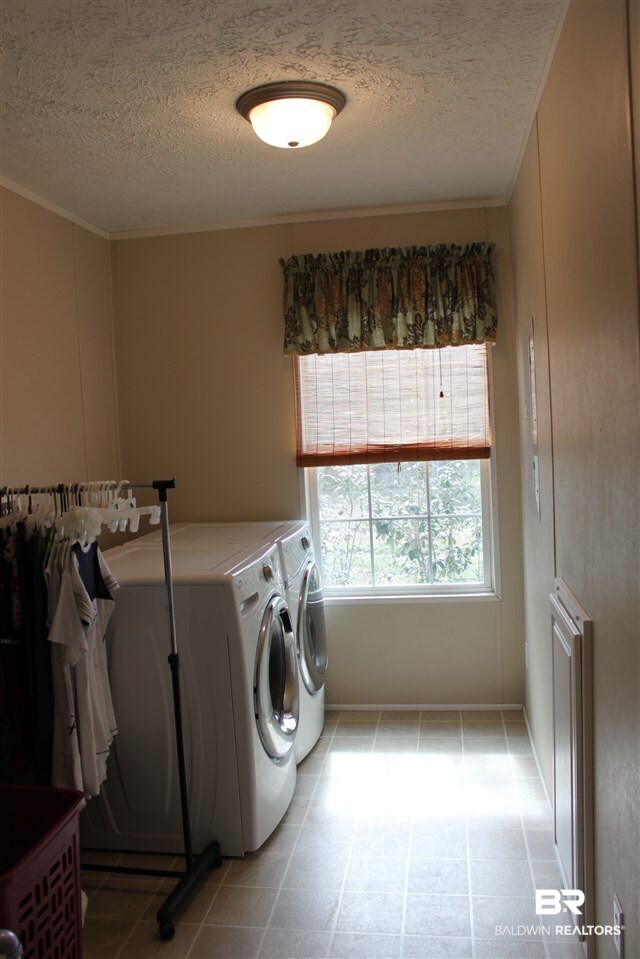 9380 Spice Pond Road Eight Mile, AL 36613 - Photo 36 of 36 Convenient attached hamper to master.