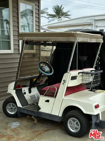a view of balcony with furniture