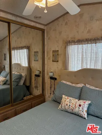 a room with window and furniture