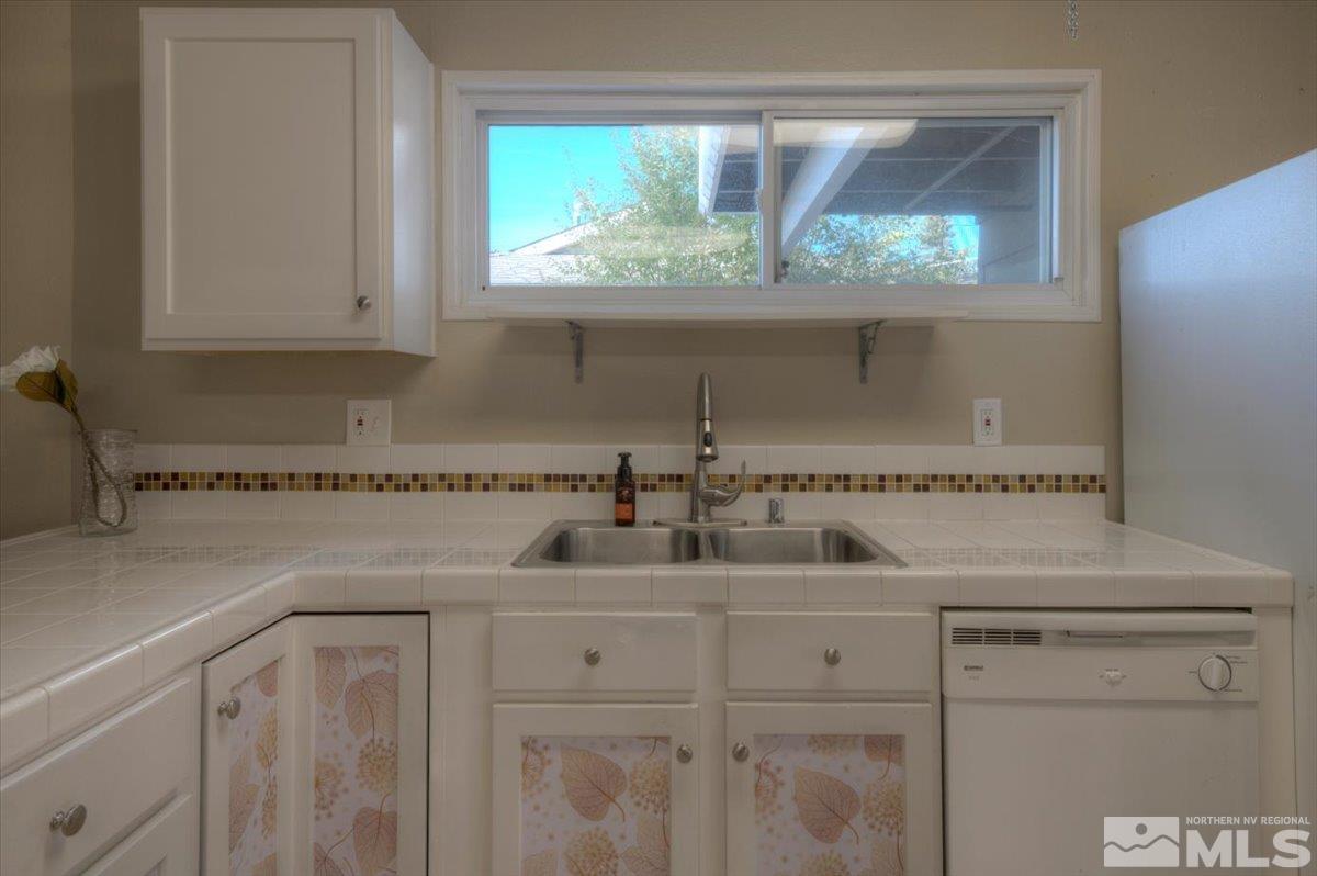 3451 Rauscher Drive Reno, NV 89503 - Photo 15 of 29 a kitchen with a sink and cabinets