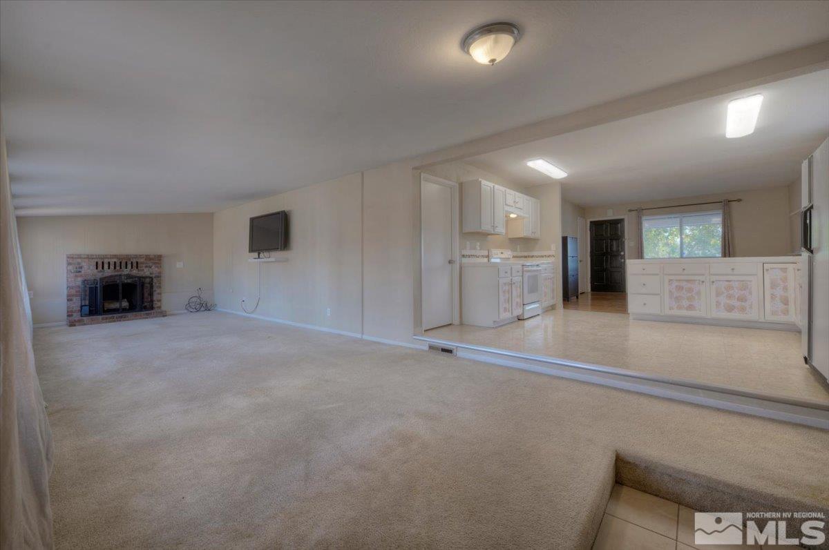 3451 Rauscher Drive Reno, NV 89503 - Photo 16 of 29 a view of a kitchen with a sink and a refrigerator