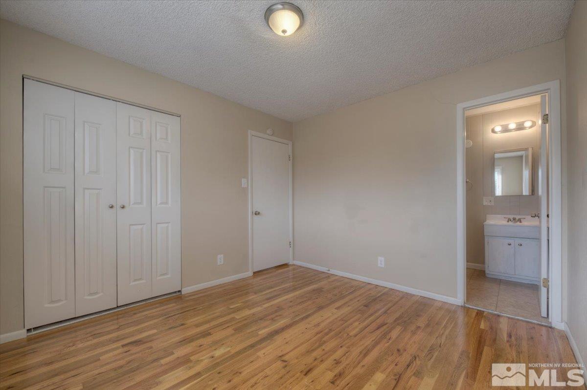3451 Rauscher Drive Reno, NV 89503 - Photo 19 of 29 wooden floor in an empty room