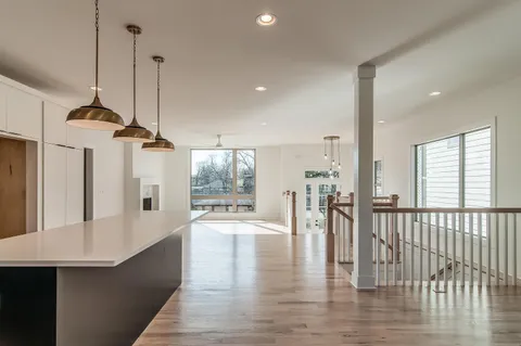 a large room with lots of wooden furniture