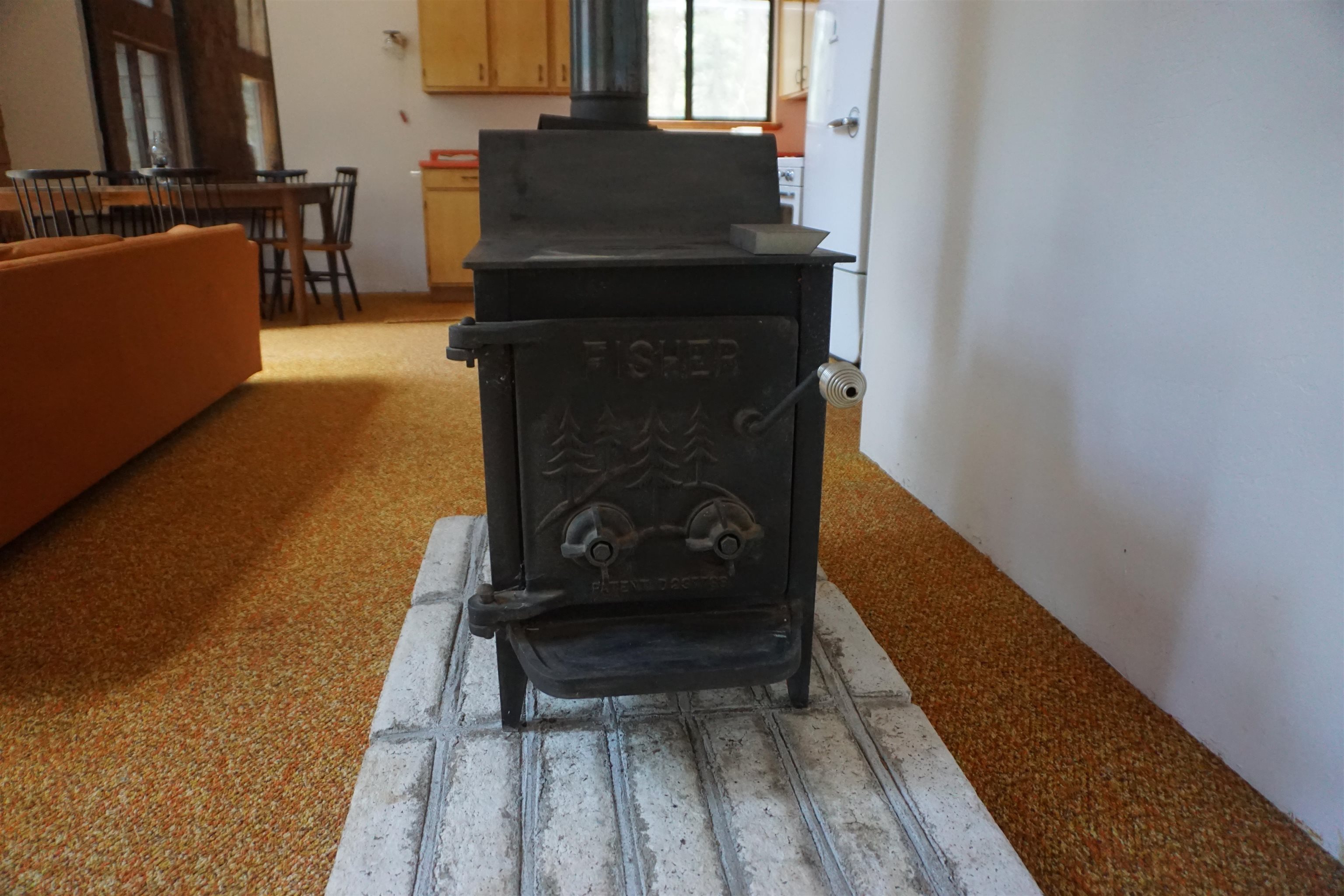 1334 Highlands Road Quincy, CA 95971 - Photo 6 of 47 a living room with a fireplace furniture and a wooden floor