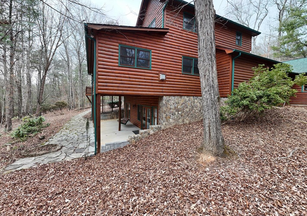 180 Shepherds Ridge Morganton, GA 30560 - Photo 11 of 66 a front view of a house with garden