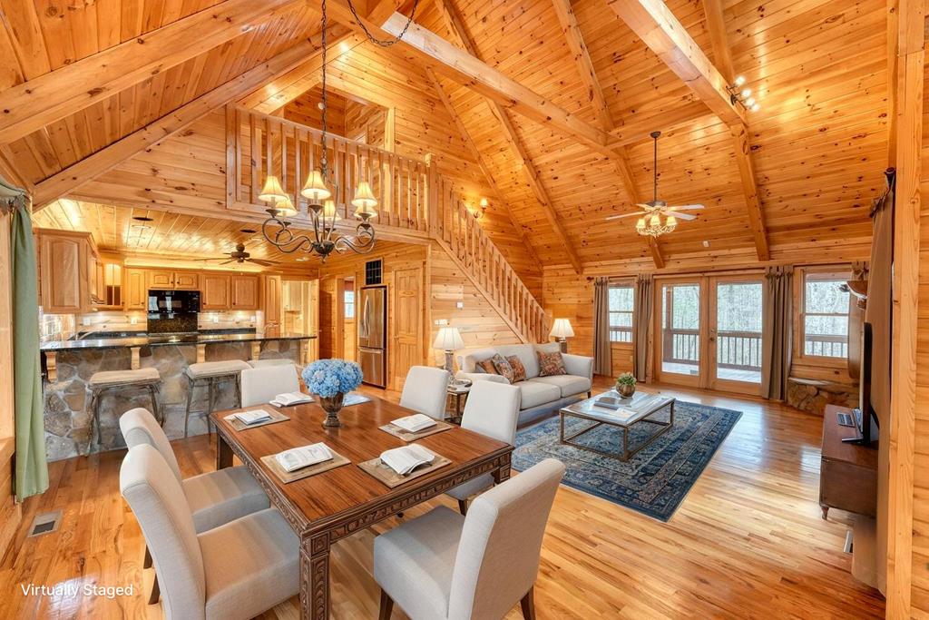 180 Shepherds Ridge Morganton, GA 30560 - Photo 2 of 66 a living room with fireplace furniture and a rug