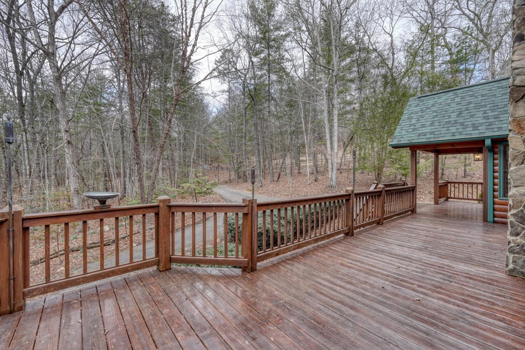 180 Shepherds Ridge Morganton, GA 30560 - Photo 26 of 66 a view of backyard with deck and wooden floor