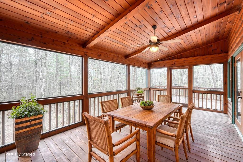 180 Shepherds Ridge Morganton, GA 30560 - Photo 4 of 66 a view of a dining room with furniture window and wooden floor