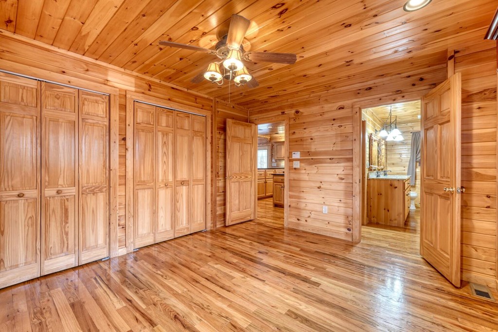 180 Shepherds Ridge Morganton, GA 30560 - Photo 42 of 66 a view of an empty room with wooden floor