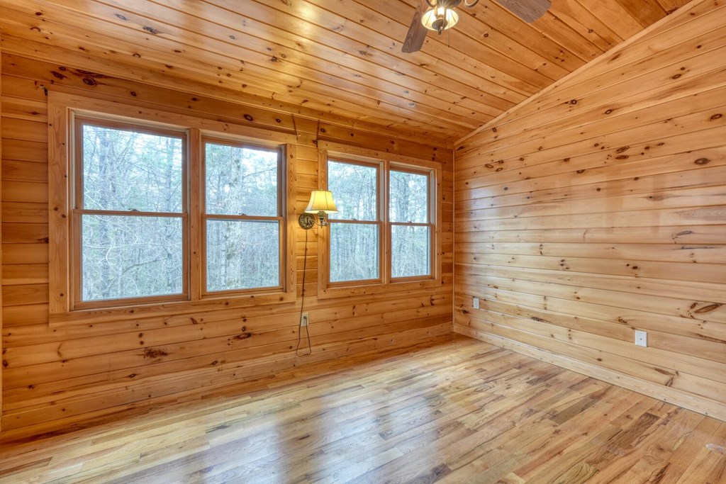 180 Shepherds Ridge Morganton, GA 30560 - Photo 43 of 66 a view of front door of house with wooden floor