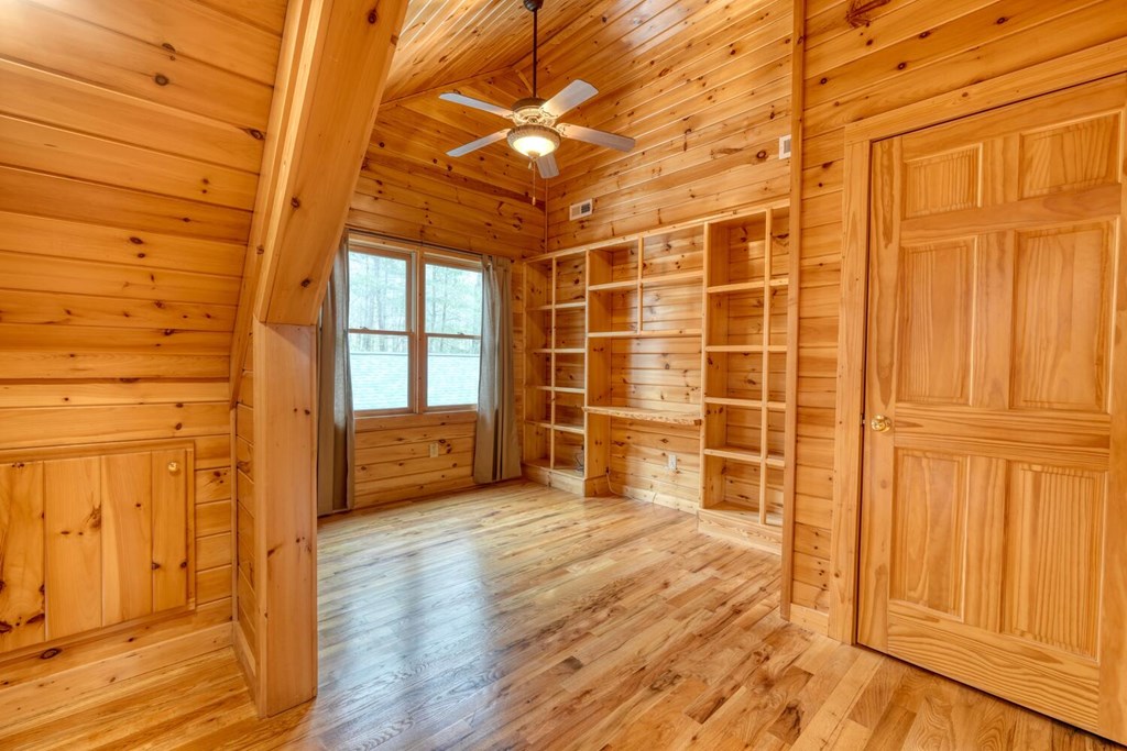 180 Shepherds Ridge Morganton, GA 30560 - Photo 49 of 66 a view of empty room with wooden floor and windows