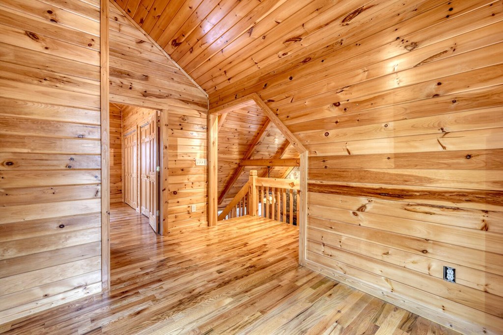 180 Shepherds Ridge Morganton, GA 30560 - Photo 50 of 66 a view of walk in closet with empty racks