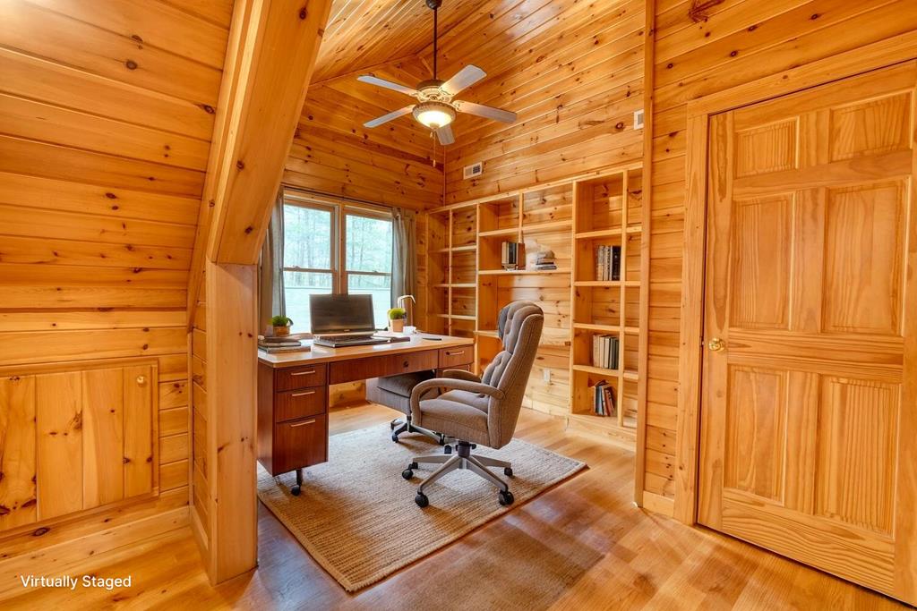 180 Shepherds Ridge Morganton, GA 30560 - Photo 5 of 66 a view of a workspace with furniture and a window